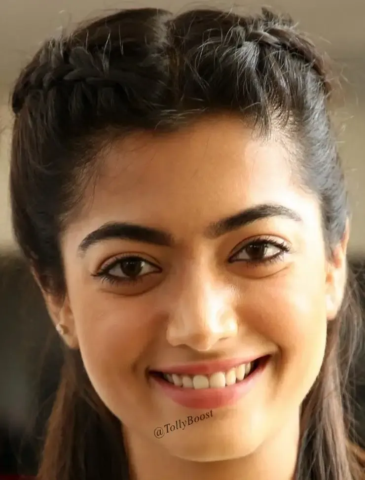 INDIAN ACTRESS RASHMIKA MANDANNA LONG HAIR SMILING FACE CLOSEUP 3